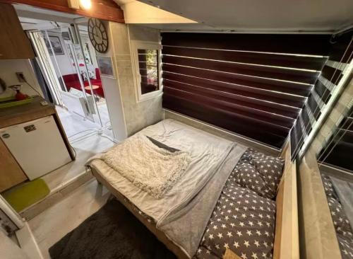 Una cama o camas en una habitación de Kucica obala