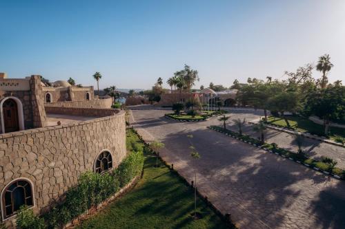 an aerial view of a building and a street at Seti Abu Simbel Lake Resort in Abu Simbel