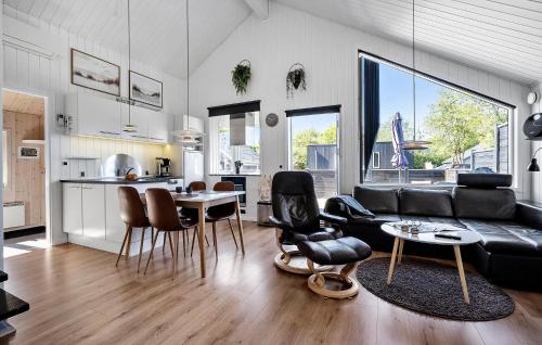 a living room with a couch and a table at Pet Friendly Home In Hemmet With Wifi in Hemmet