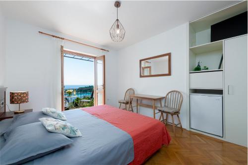 Postel nebo postele na pokoji v ubytování Guest House Međine