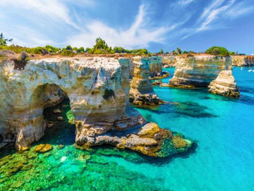 a view of the amazing eroded limestone cliffs at Case vacanze LULU in Seclì