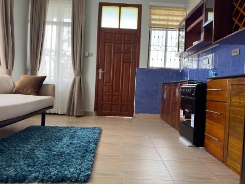 Dapur atau dapur kecil di 4 Stylish Two Bedroom Apartment Units in Mbezi Beach