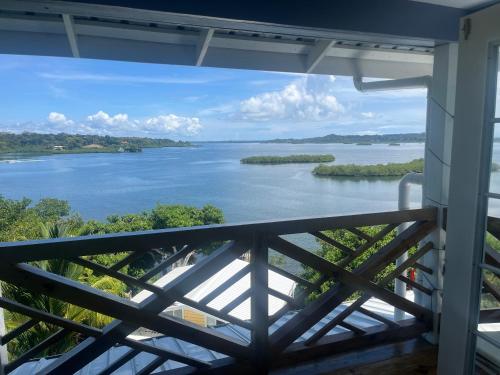 a view of a river from the balcony of a house at SEAHORSE POINT HOTEL and NATURE RESERVE in Bocas del Toro