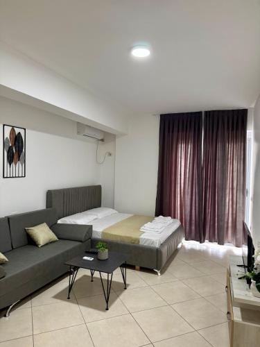 Postel nebo postele na pokoji v ubytování Apartament Niko shengjin