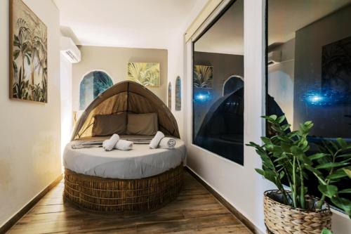 a bedroom with a bed in a room at Bella Terra Villa Filerimos in Rhodes Town