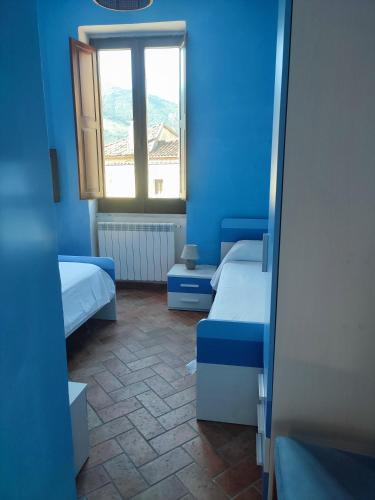 Llit o llits en una habitació de Casa Vacanze "Il Mirto"