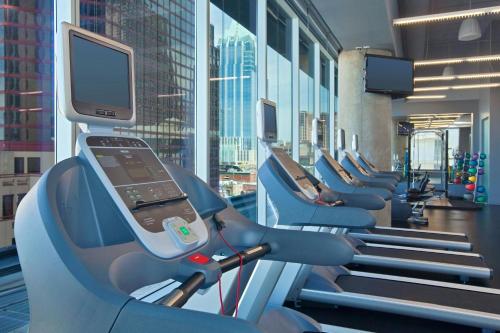 a row of exercise machines in a gym at W Austin in Austin