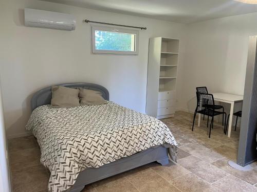 Katil atau katil-katil dalam bilik di Logement en campagne