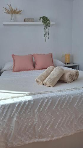 Postel nebo postele na pokoji v ubytování Casita Los Pinos