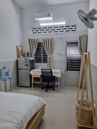 Ένα ή περισσότερα κρεβάτια σε δωμάτιο στο Tran Phu Riverside House