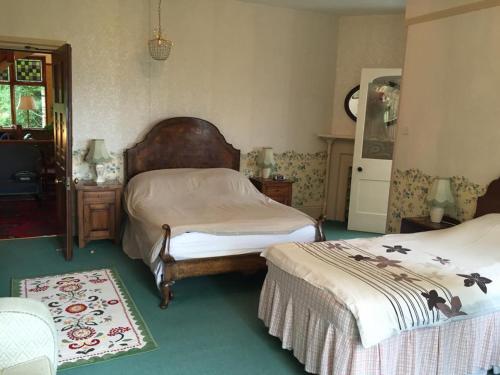 Katil atau katil-katil dalam bilik di Oakfield Lodge Guest House Stockport