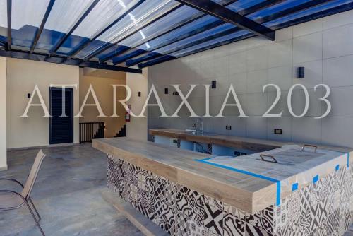 a store with a large sign on the wall at Amazing 2 bedrooms apartment with a pool in Sayulita in Sayulita