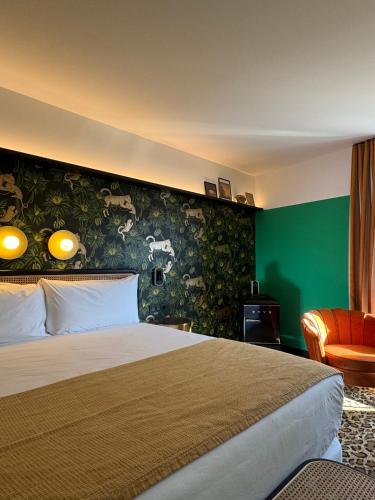 Un ou plusieurs lits dans un hébergement de l'établissement Hotel Divino & Aparthotel