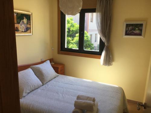A bed or beds in a room at Beautiful house in Cangas near the beach