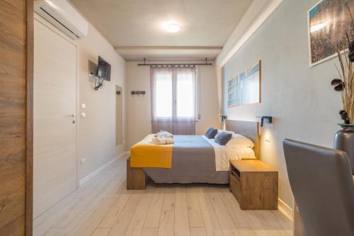Postel nebo postele na pokoji v ubytování B&B DaBi