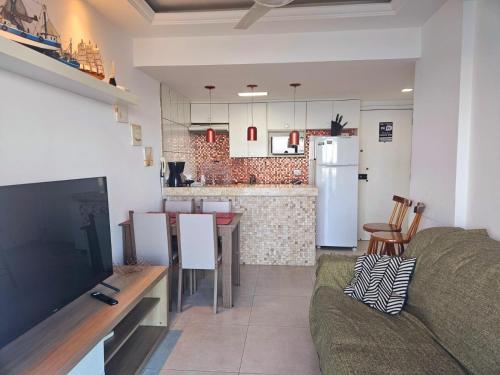 Η κουζίνα ή μικρή κουζίνα στο Apartamento Praia Porto Real