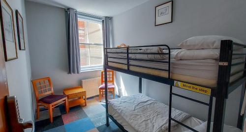 Postel nebo postele na pokoji v ubytování R S Hostels - Leeds