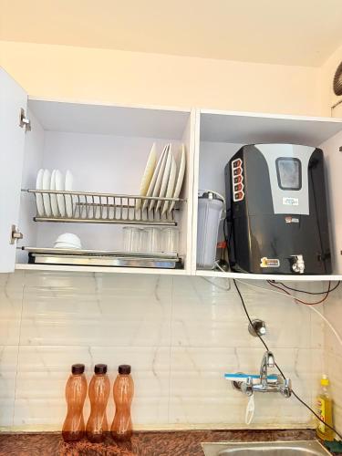 Η κουζίνα ή μικρή κουζίνα στο Aura 12 1BR Service Apartment