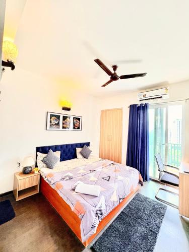 Ένα ή περισσότερα κρεβάτια σε δωμάτιο στο Aura 12 1BR Service Apartment