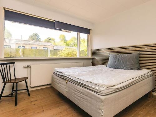 Ένα ή περισσότερα κρεβάτια σε δωμάτιο στο 5 person holiday home in Kerteminde