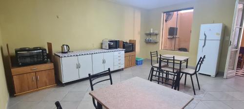 Kuchyň nebo kuchyňský kout v ubytování Patagonia Hostel