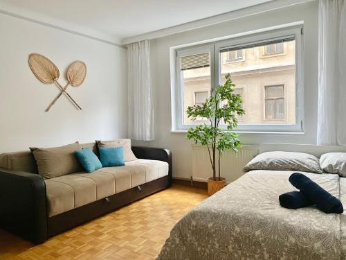 Una cama o camas en una habitación de 70 m2 Apartment in Classy Area