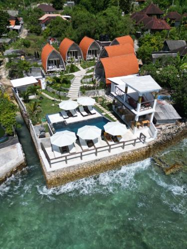 an aerial view of a resort in the water at WALET PARADISE Ceningan Villa in Nusa Lembongan