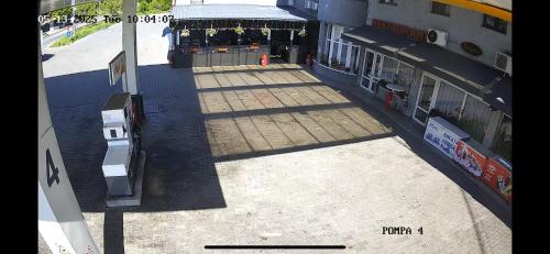 an overhead view of a street in front of a building at Hotel Dalia in Gilău