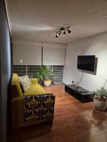 TV a/nebo společenská místnost v ubytování Bello Departamento Ideal para el Relax