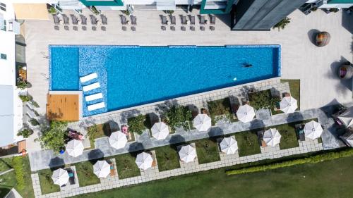 an overhead view of the pool at the resort at The Bayou Hotel Langkawi in Pantai Cenang