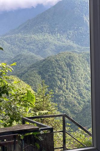 a view of a mountain view from a window at Catcat Garden House in Sa Pa