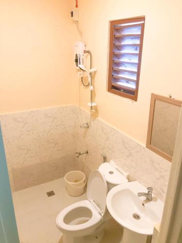 Ένα μπάνιο στο Azuls Tourist Inn