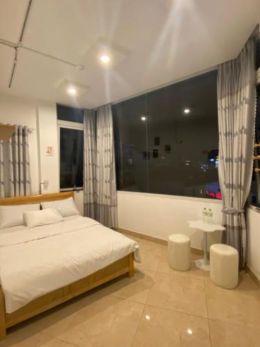 Katil atau katil-katil dalam bilik di 05 Đoàn Thị Điểm Hotel