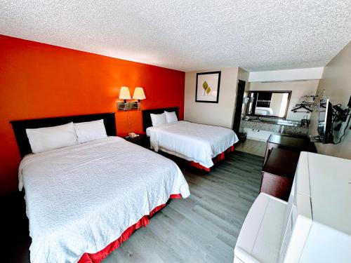 Ένα ή περισσότερα κρεβάτια σε δωμάτιο στο Relax Inn Henryetta