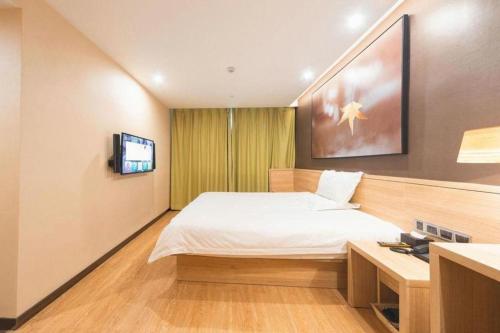 Μια τηλεόραση ή/και κέντρο ψυχαγωγίας στο IU Hotel Changsha Railway Station Branch