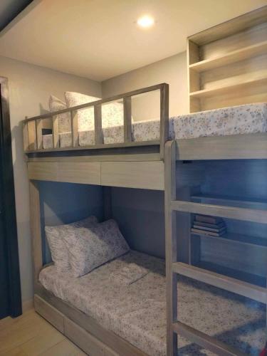 a couple of bunk beds in a room at Regner-Quinto Real Estate Services in Cebu City