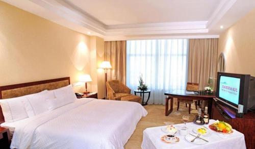 Letto o letti in una camera di Urumqi Tianyuan Hotel