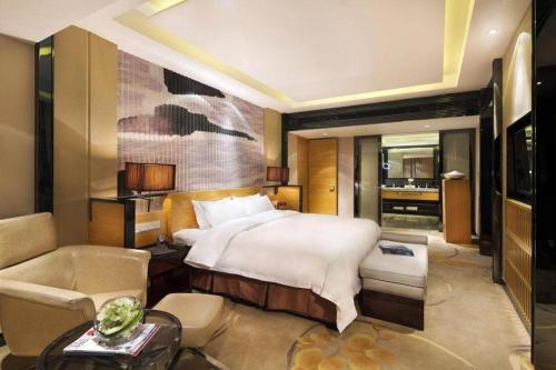 Letto o letti in una camera di Urumqi Tianyuan Hotel