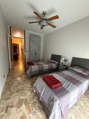 Katil atau katil-katil dalam bilik di Apartamento Malpensa Milano