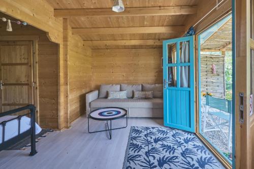 Χώρος καθιστικού στο Eudaimonia Wooden Suites Nafplio Kandia