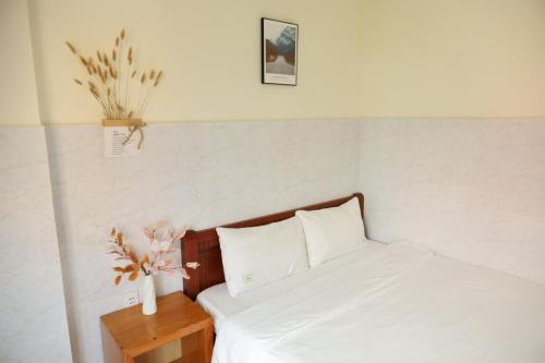Кровать или кровати в номере De Luna House Dalat - Homestay giá rẻ