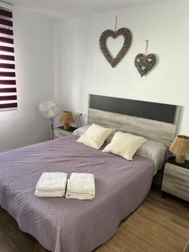 Postel nebo postele na pokoji v ubytování Apartamento en el mar