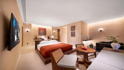 Letto o letti in una camera di Terra Art Garden Hotel