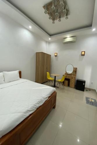 Postel nebo postele na pokoji v ubytování Phố Biển 3