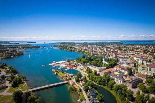 an aerial view of a river and a city at large Villa In Central Motala in Motala