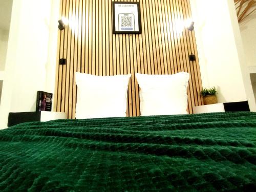 Cama ou camas em um quarto em The Secret Motel - Le Jade