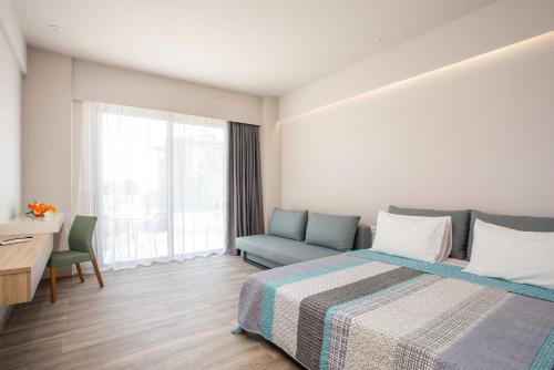 Postel nebo postele na pokoji v ubytování Gennadi Seaside Resort