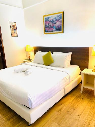 Postel nebo postele na pokoji v ubytování Bintang Lux B&B Suites Times Square KL