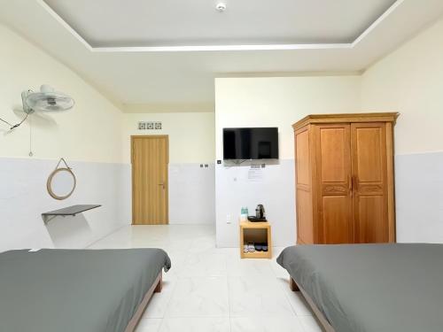 Телевизор и/или развлекательный центр в De Luna House Dalat - Homestay giá rẻ