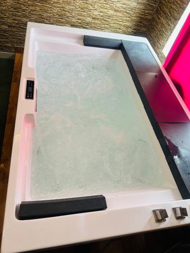 a table with a tray of water on a scale at hotel deep palace in Varanasi